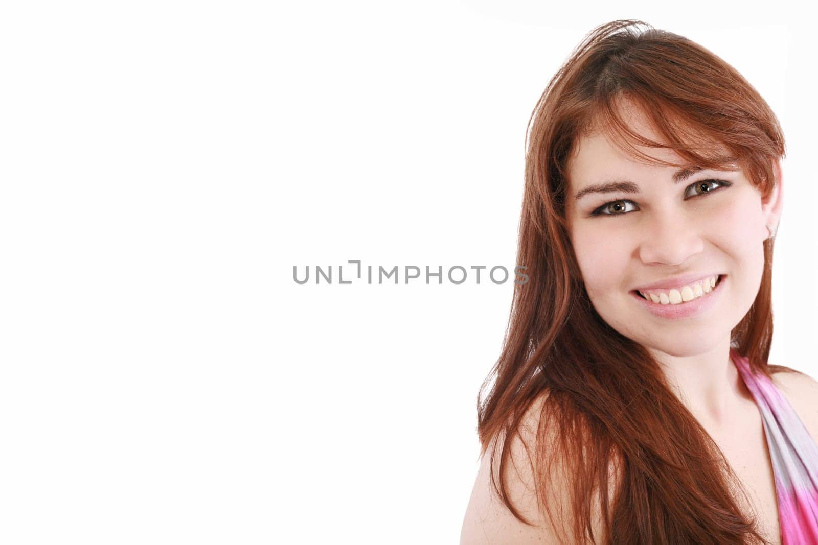 Portrait of beautiful woman isolated on white looking at copyspace