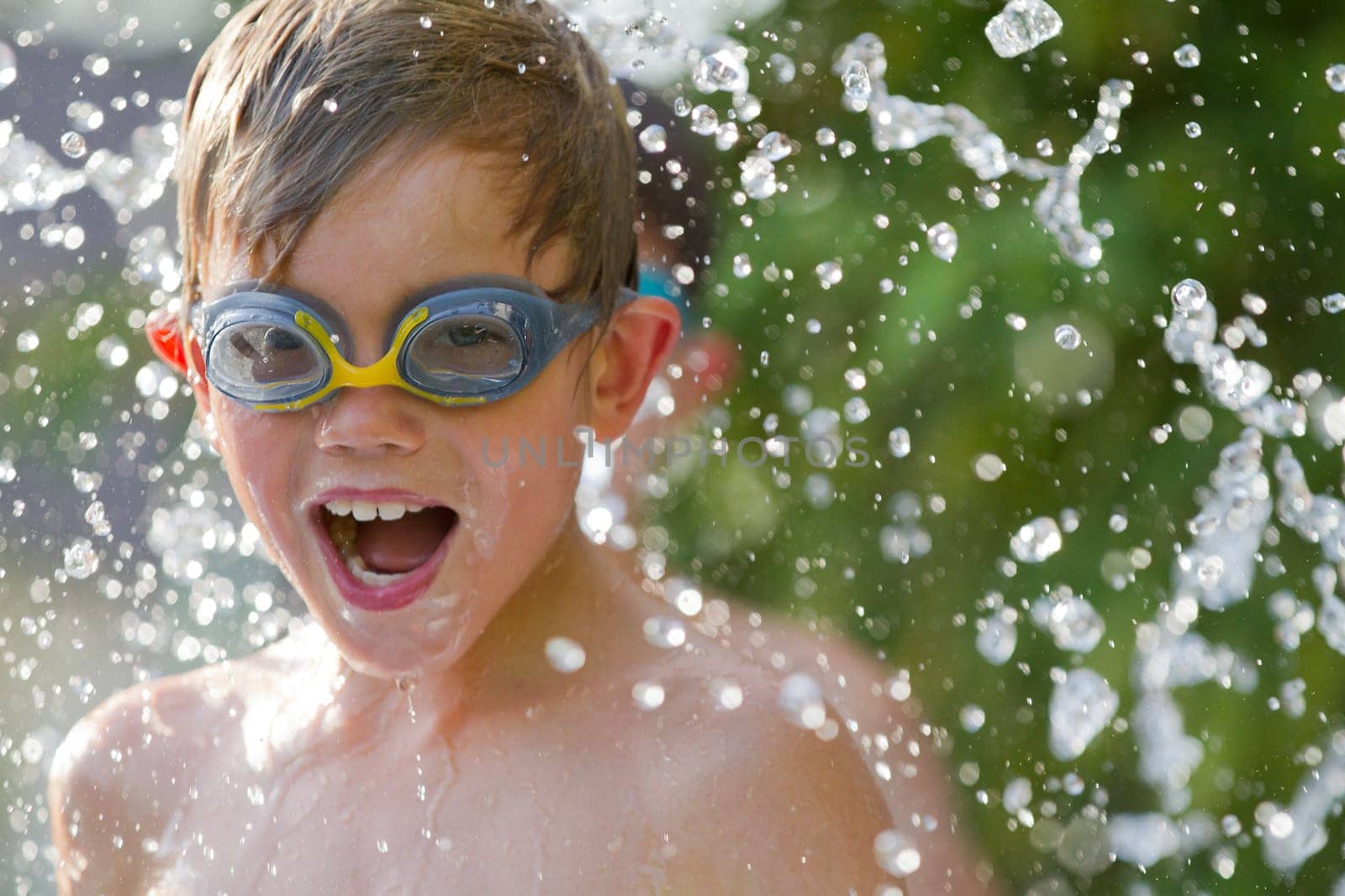 Young child playing in the water