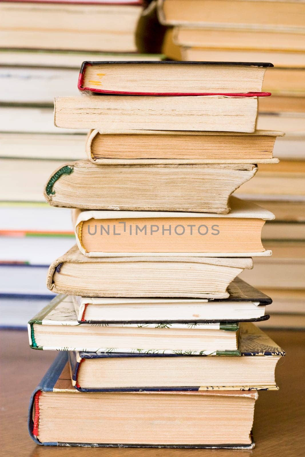 stack of old books at public library