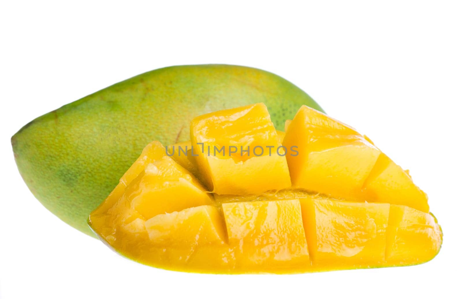 a green mango on white background