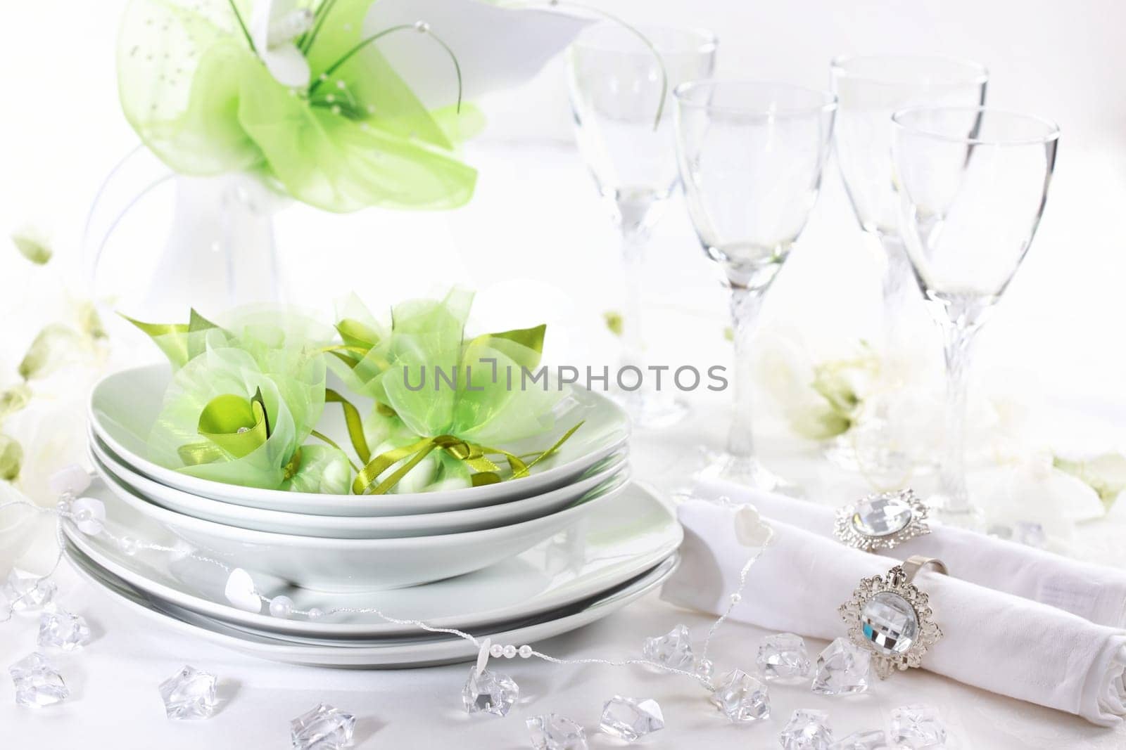 Luxury place setting for wedding in white and green tone