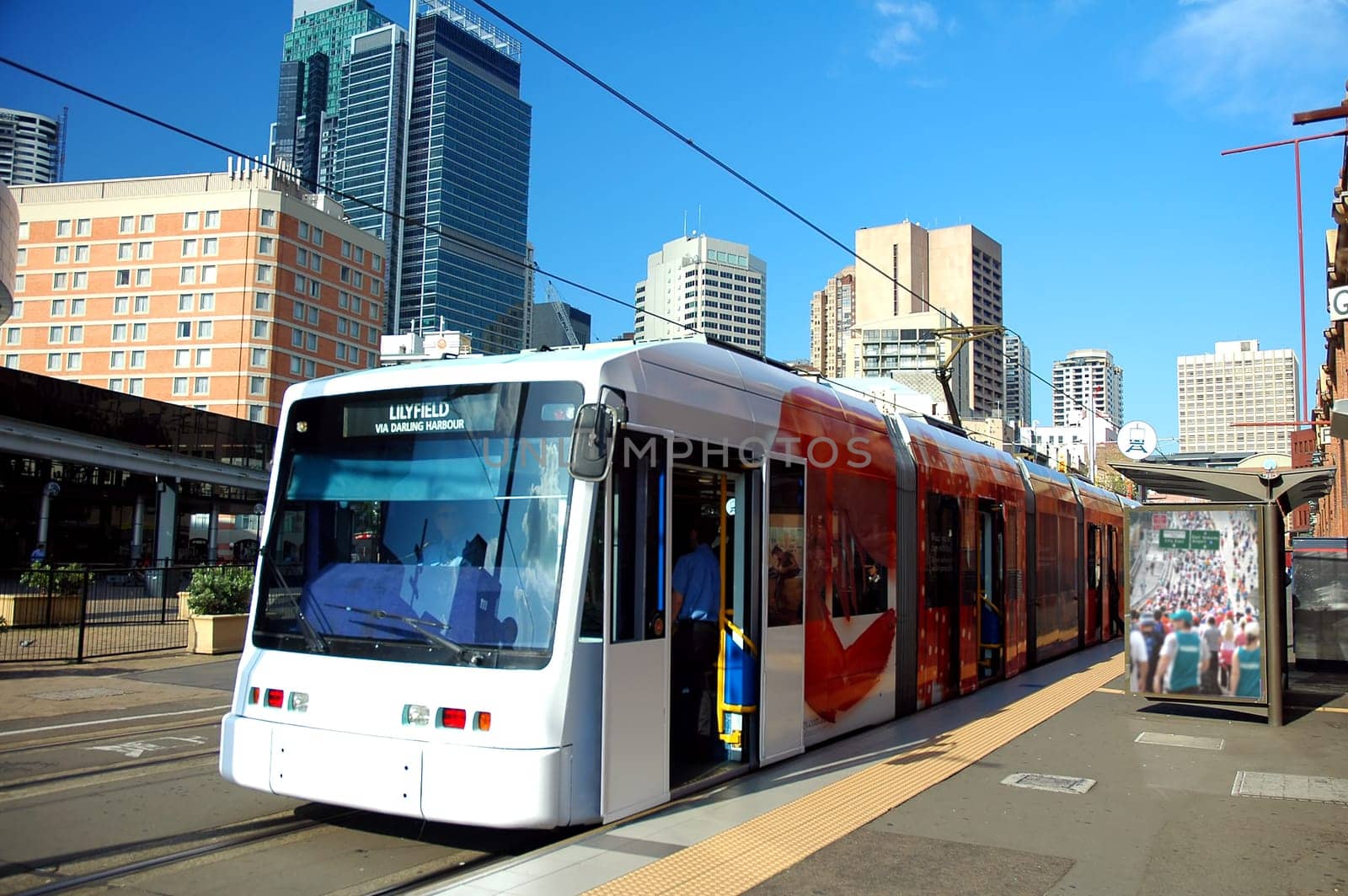 train in sydney, buildings in background, logos and advertisements removed