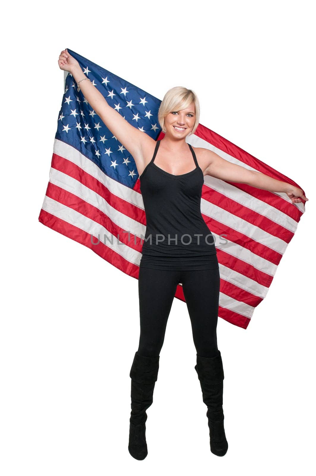A beautiful young woman holding an American flag