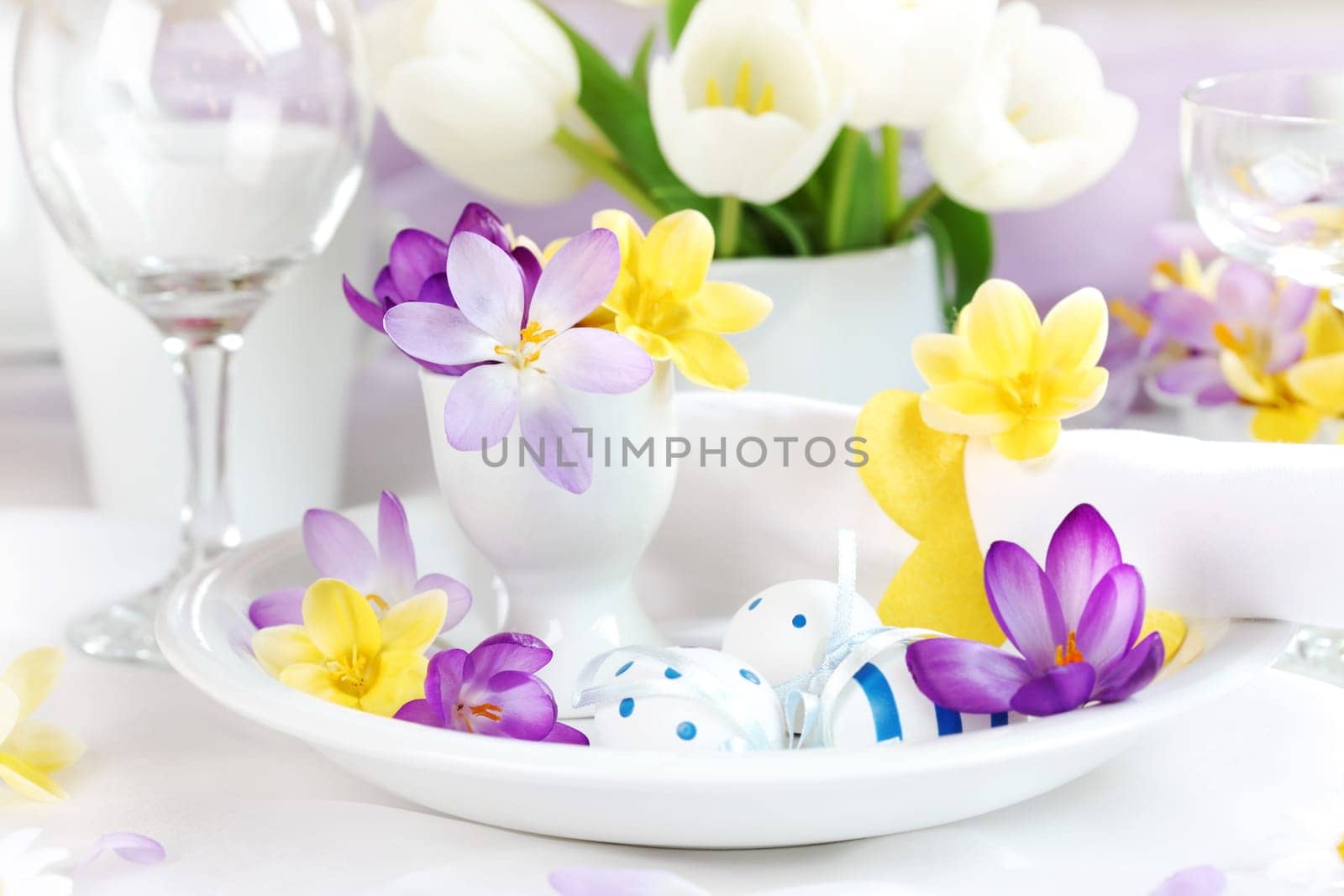Place setting for Easter with crocuses and Easter eggs
