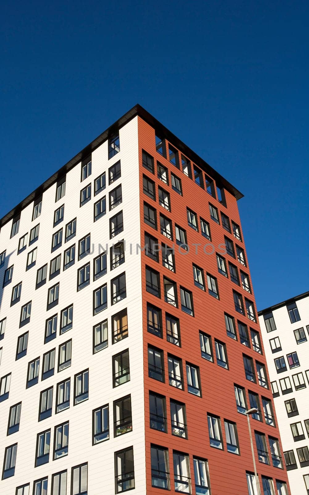 Orange Building Exterior towards Blue sky