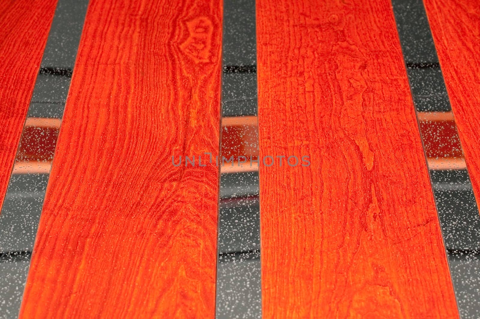 raindrops on a background of redwood and chrome