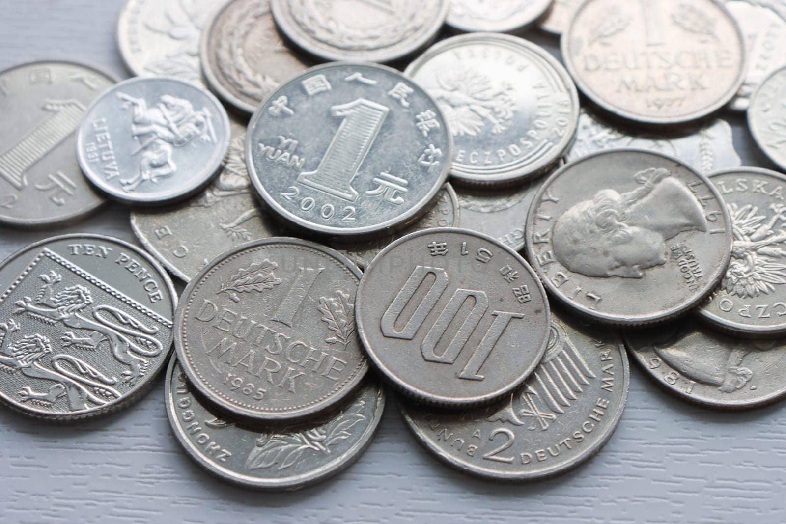 Modern metal coins from different countries, close-up. by gelog67