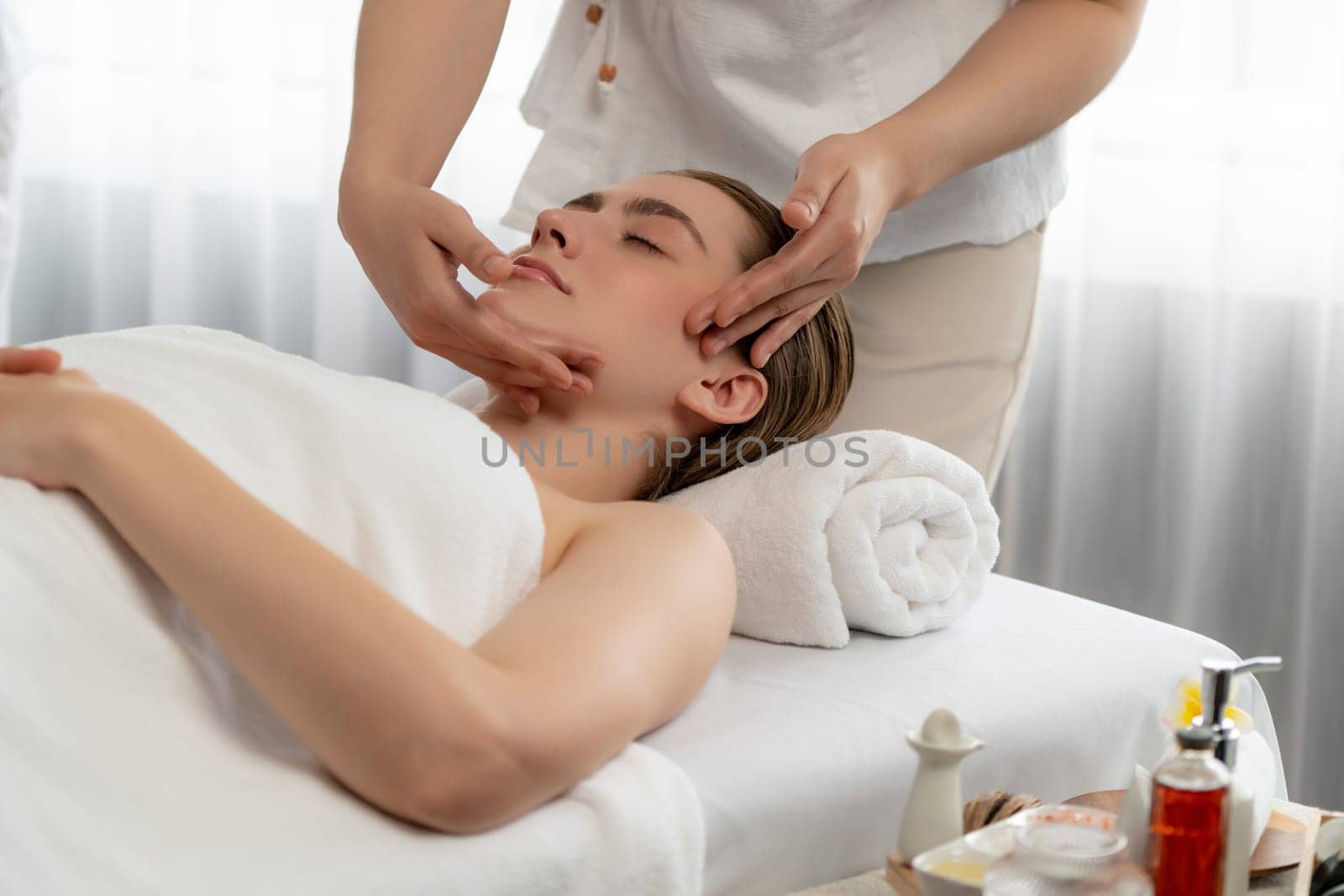 Caucasian woman enjoying relaxing anti-stress head massage. Quiescent by biancoblue