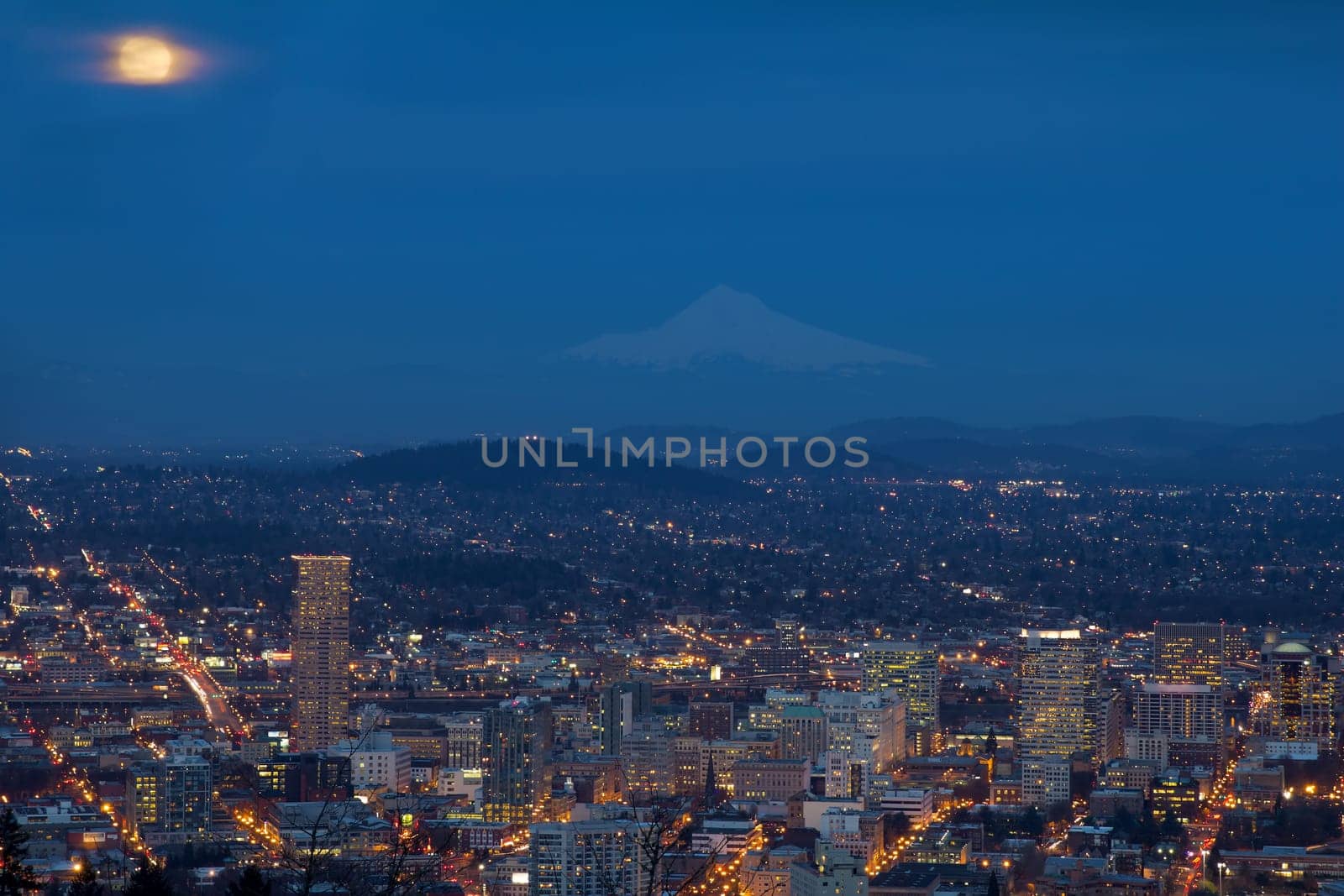 Full Moon Rising Over Portland Oregon Cityscape and Mount Hood at Blue Hour