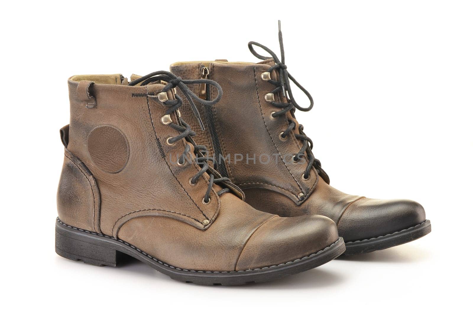 A pair of man&#039 s leather shoes isolated on white