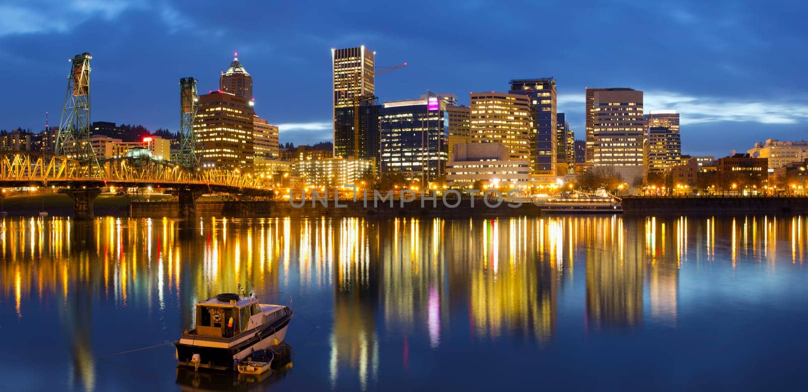 Portland Oregon Downtown Waterfront  Skyline along Willamette River at Blue Hour Twilight