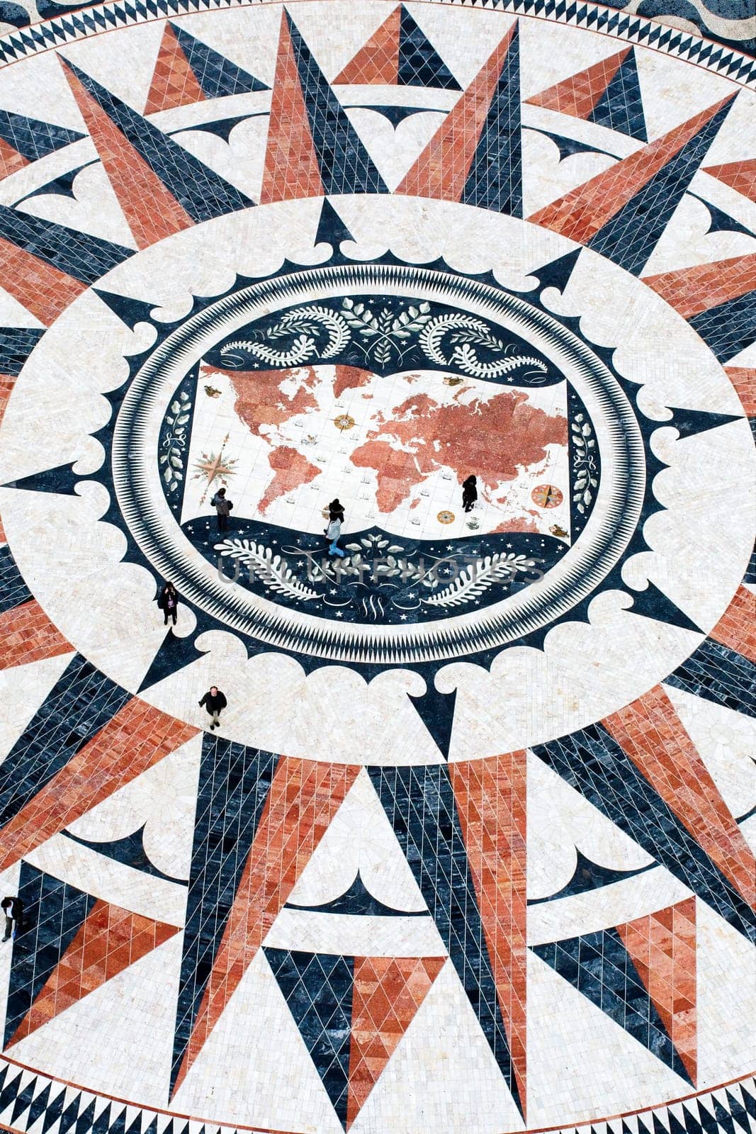 Giant sized compass drawn on the ground nearby Lisbon Discoveries monument
