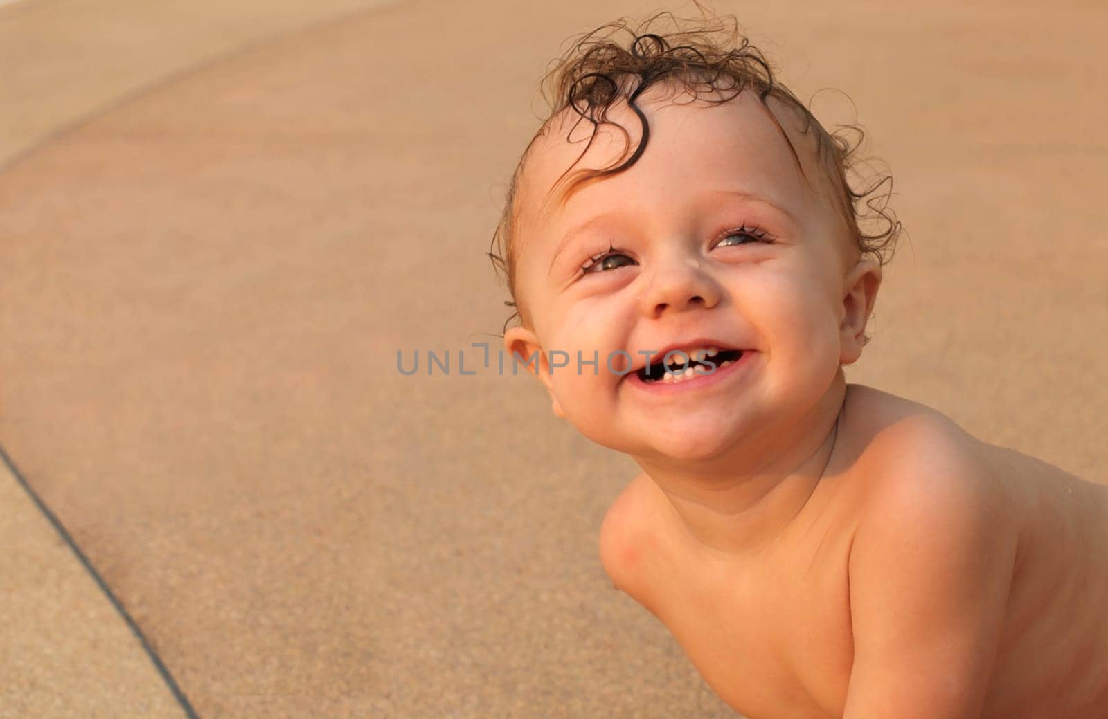 happy the child looks into the camera