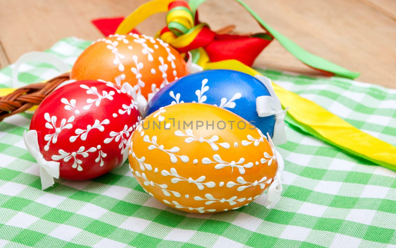 Traditional Homemade Color Painted Easter Eggs on Wooden Table