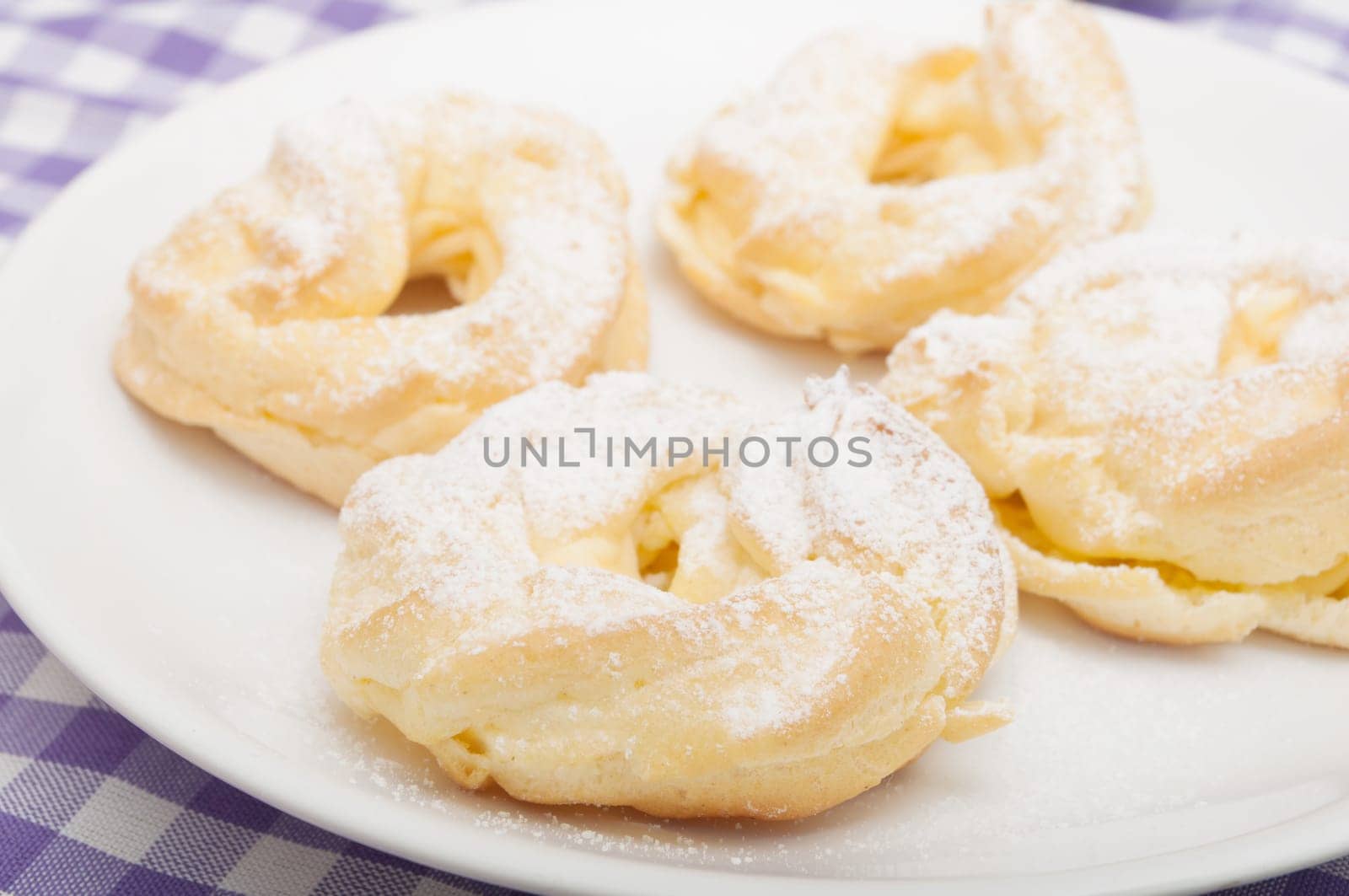 Homemade Cream Puffs With Powdered Sugar