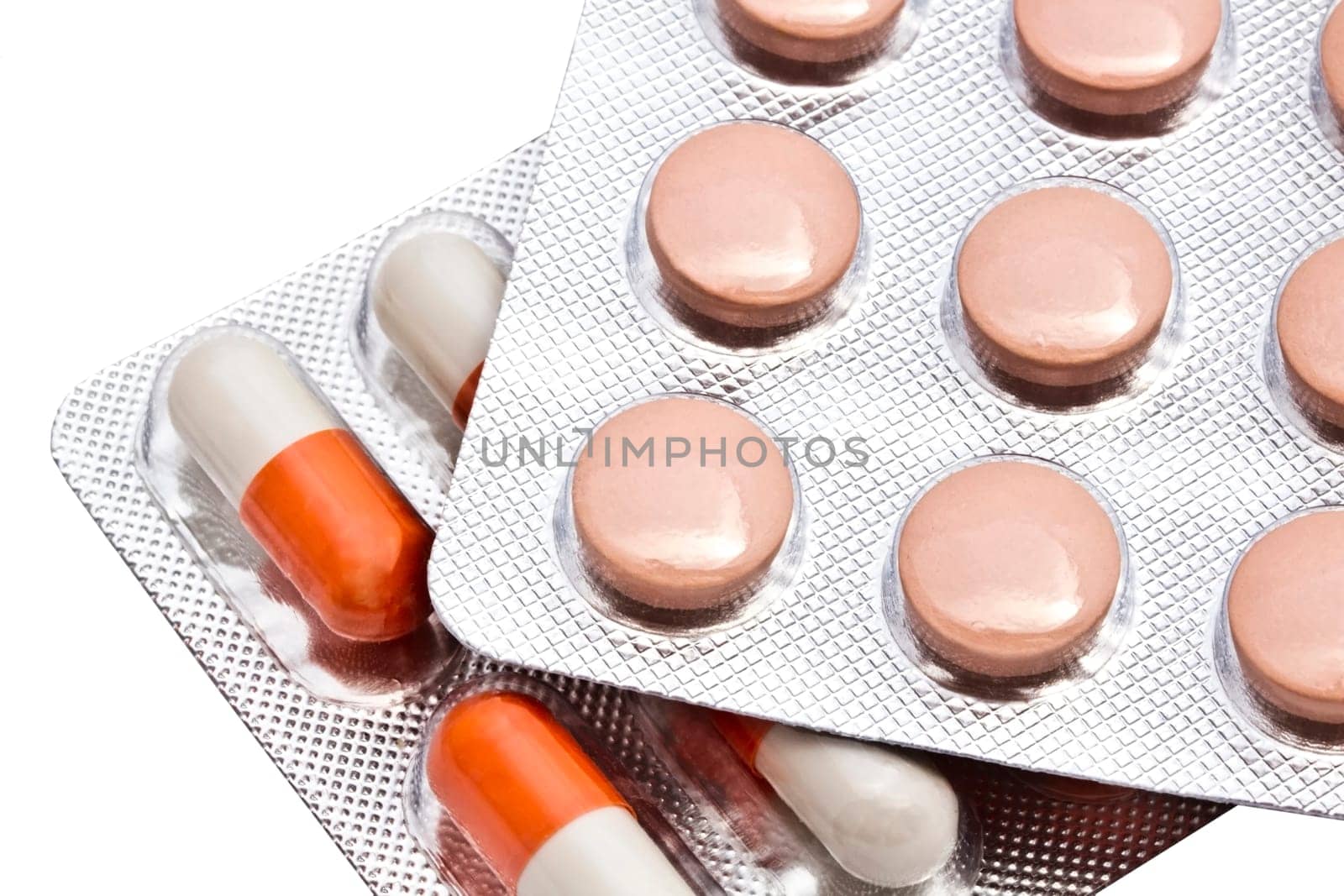 Pills and capsules isolated on white background