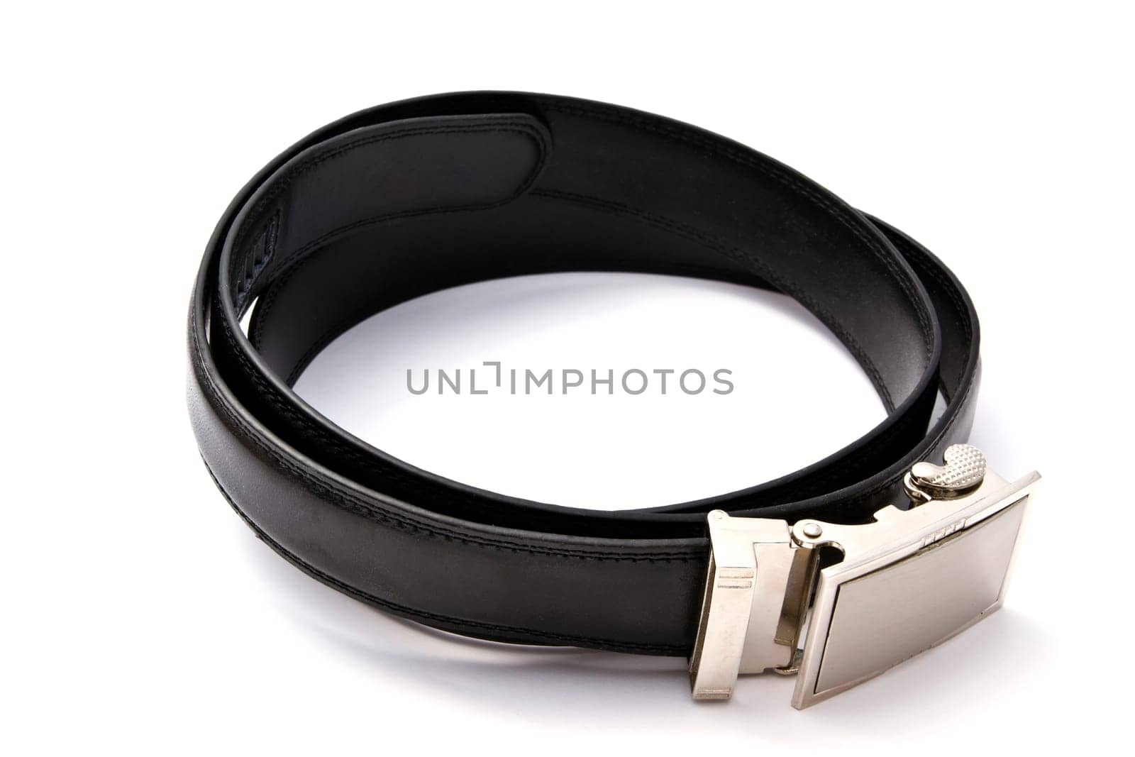 Leather belt closeup on white background
