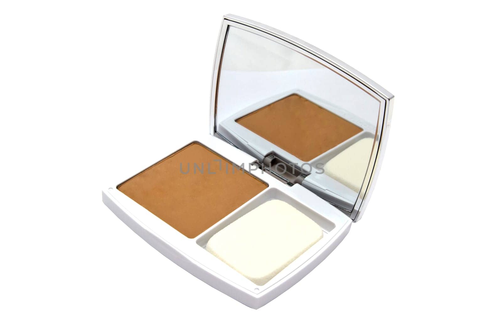 Powder compact closeup on white background