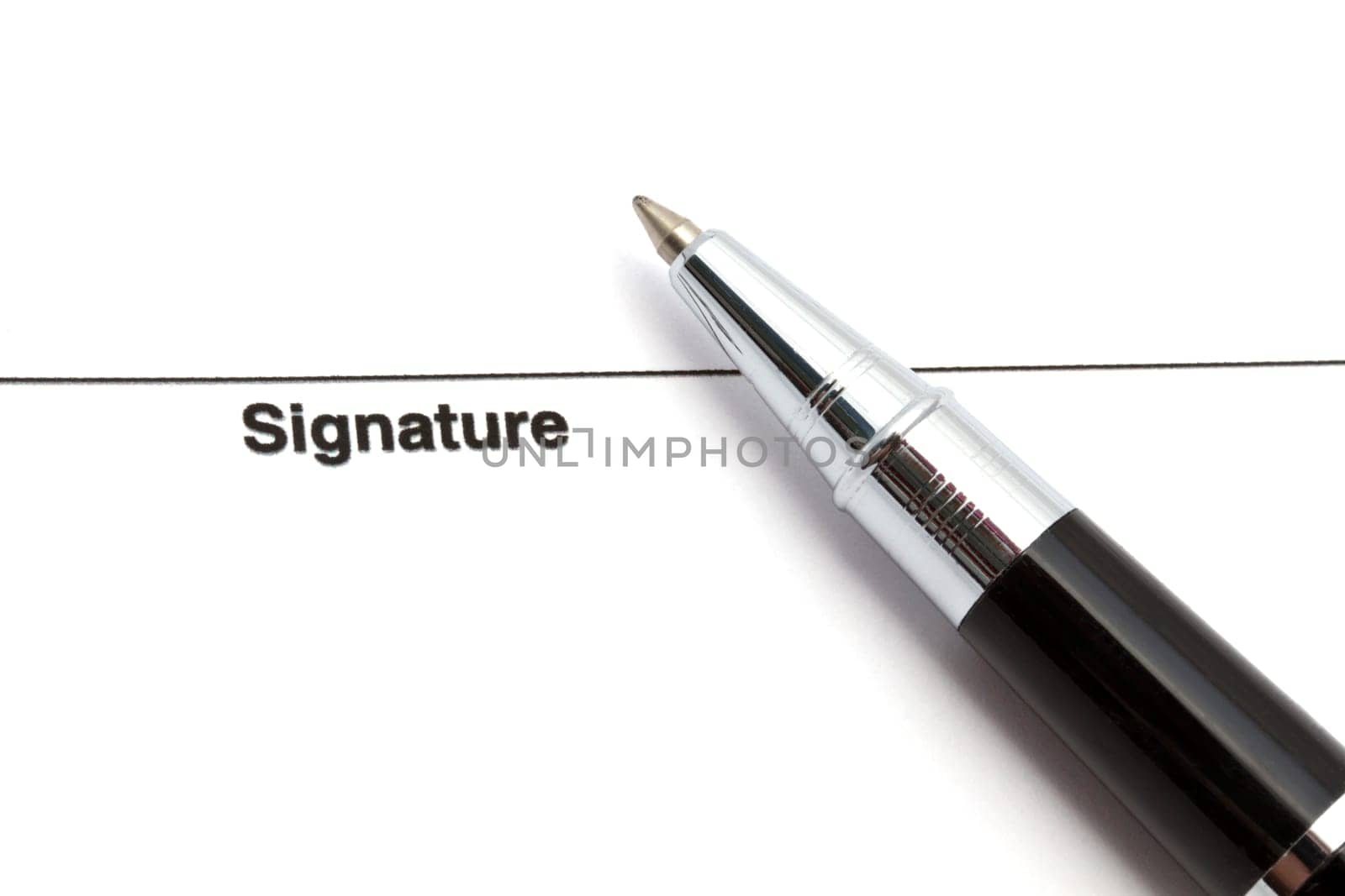 Pen isolated on a blank signature paper