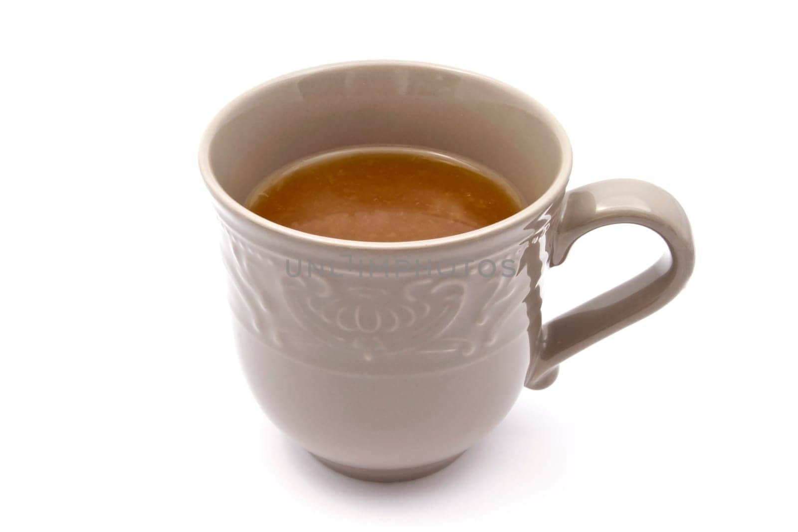 Cup of tea closeup on white background