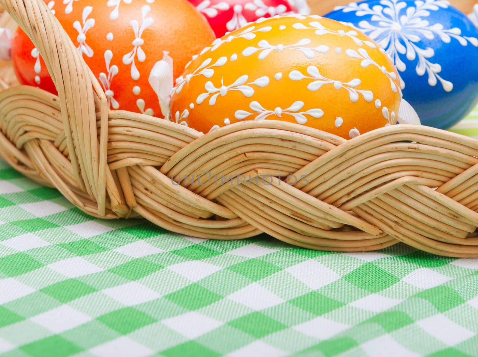 Traditional Color Painted Easter Eggs in Basket