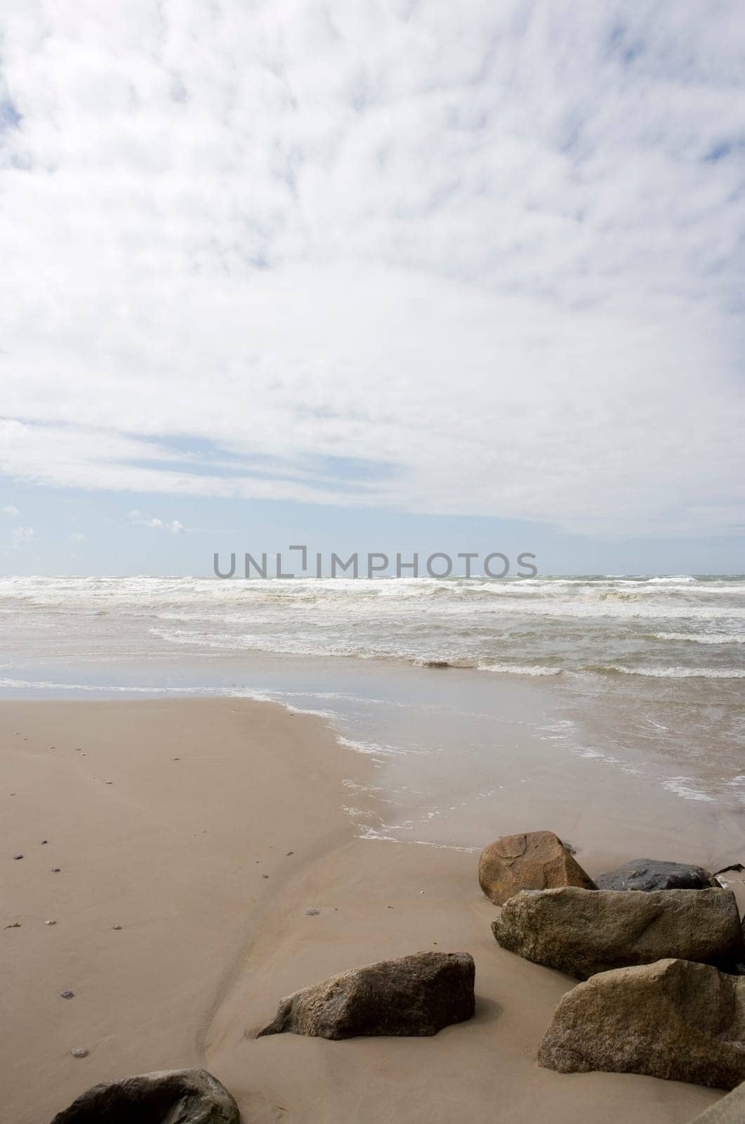 View of a beach on a cloudy day
