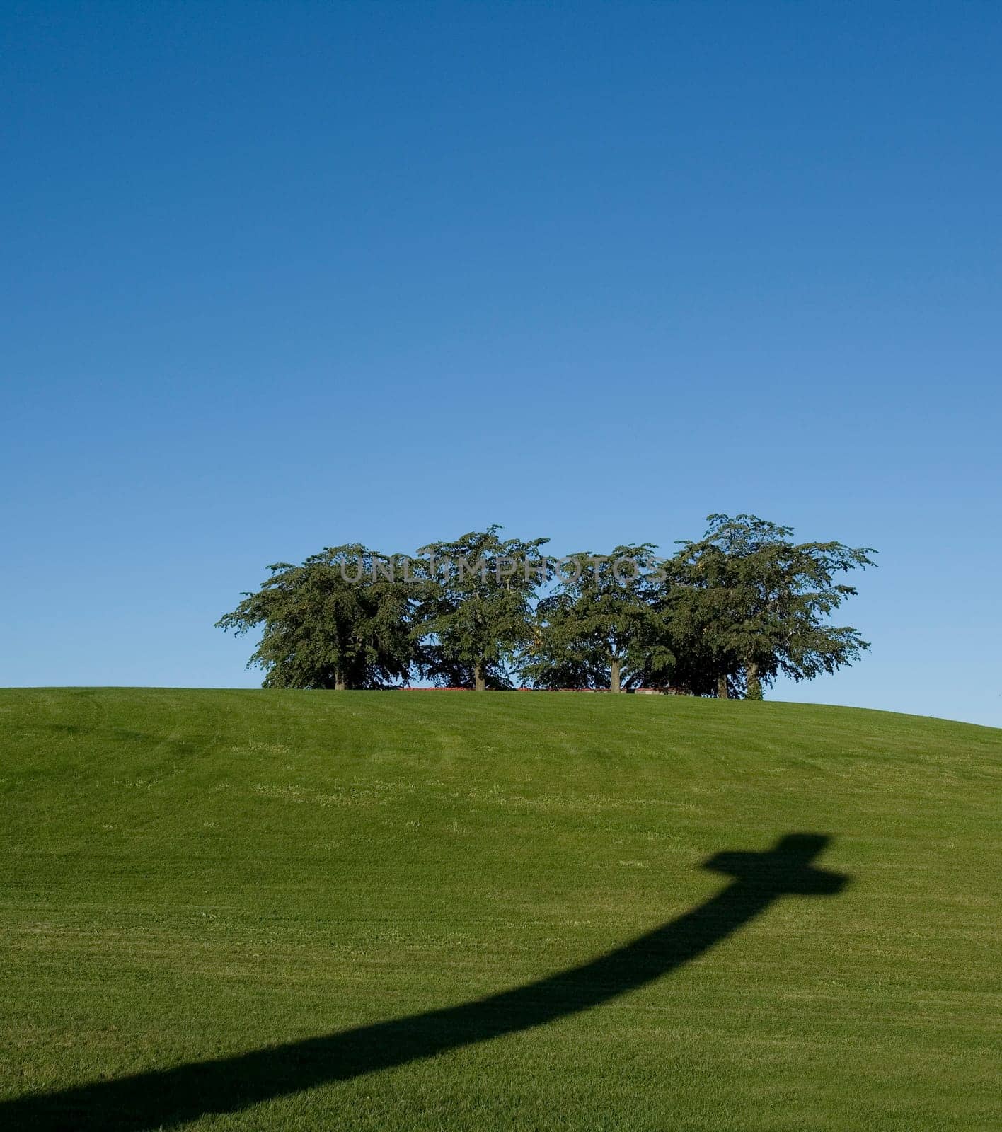 Cross shadow in the grass
