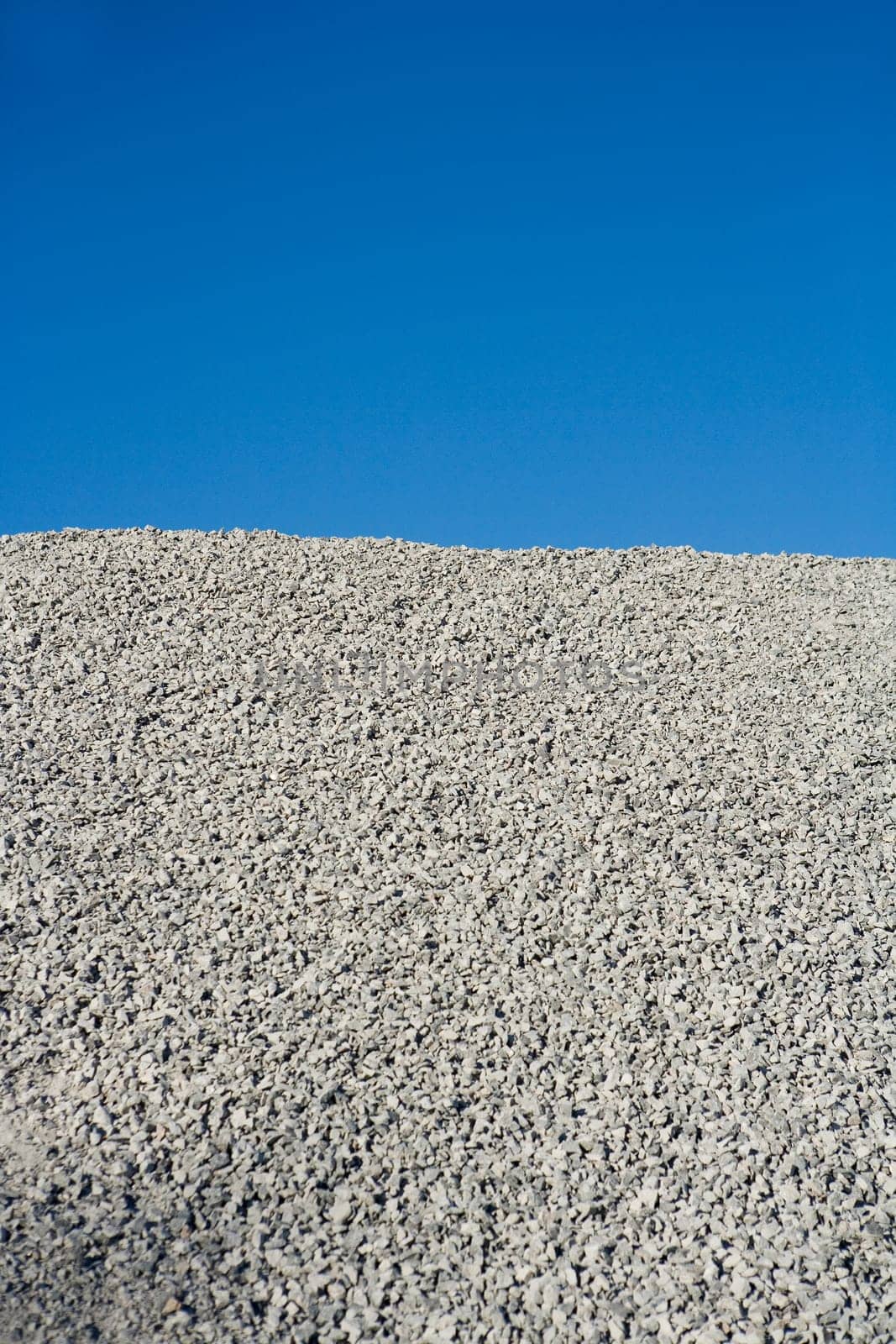 Stack of Gravel towards Blue sky