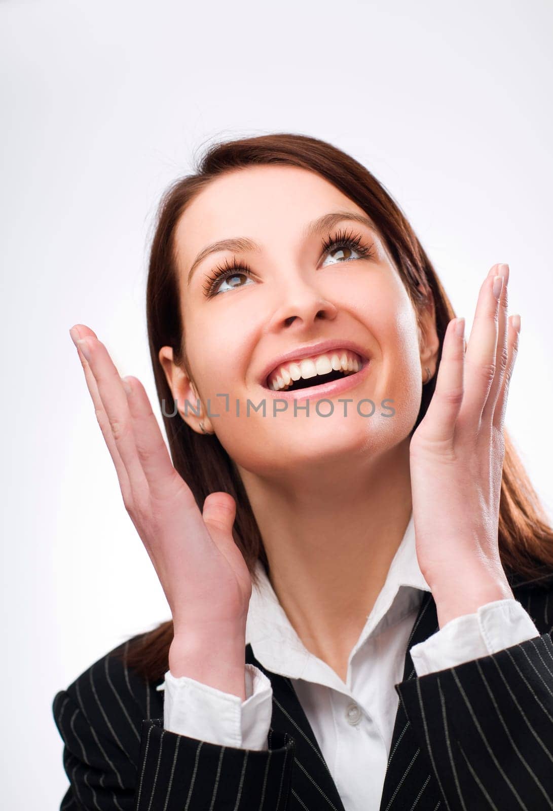 Young business woman looking up close up