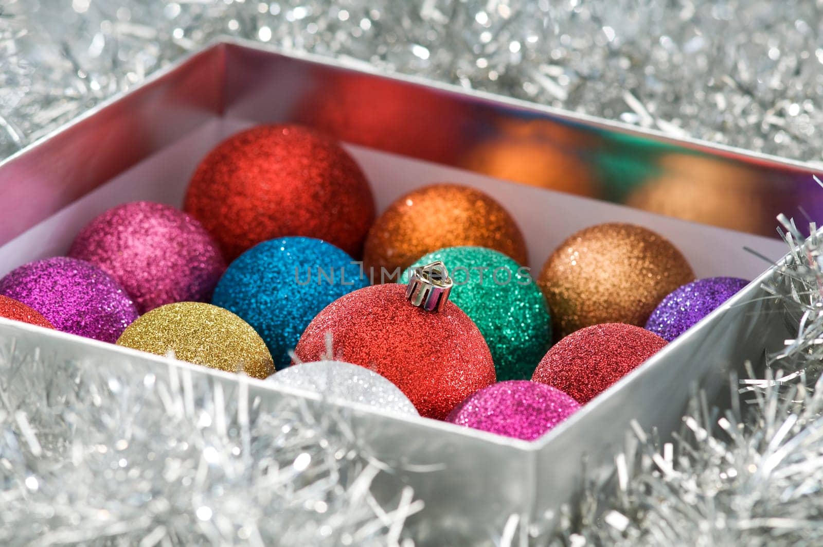 colorful christmas balls in the box close up shoot