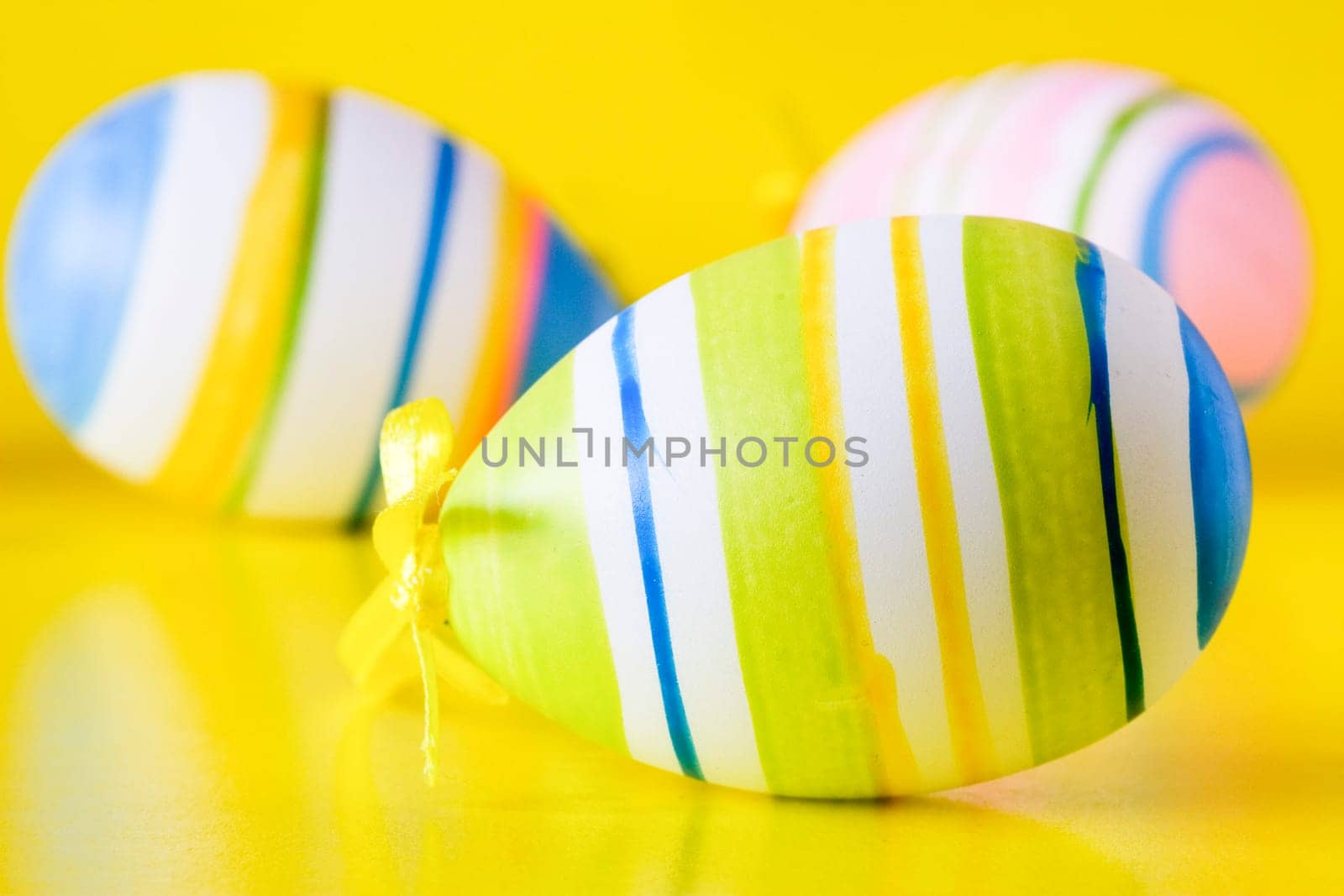 close-up of a easter eggs isolated on yellow background
