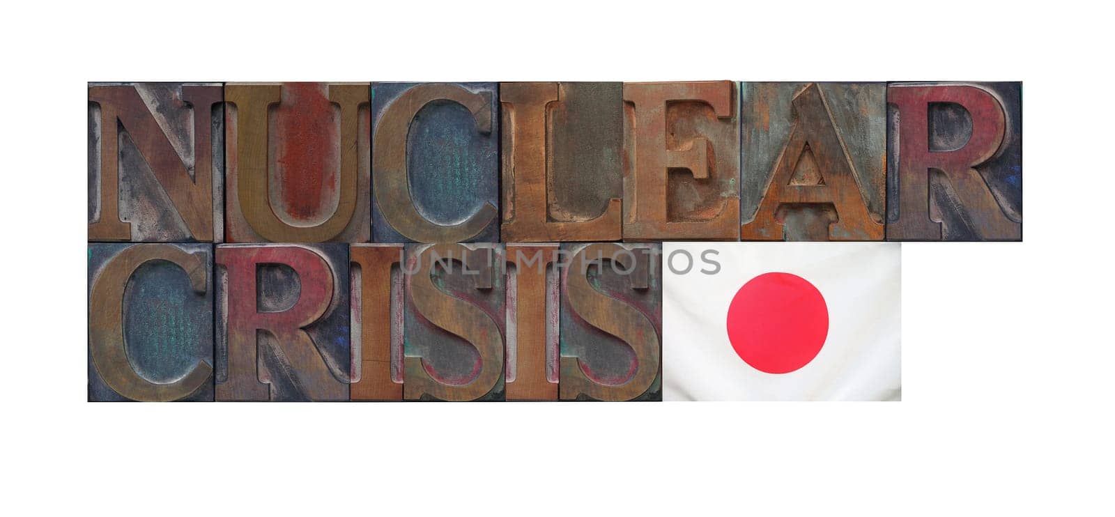 the words nuclear crisis with a Japanese flag