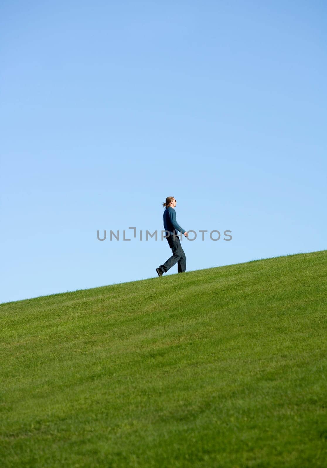 Side view of a walking man