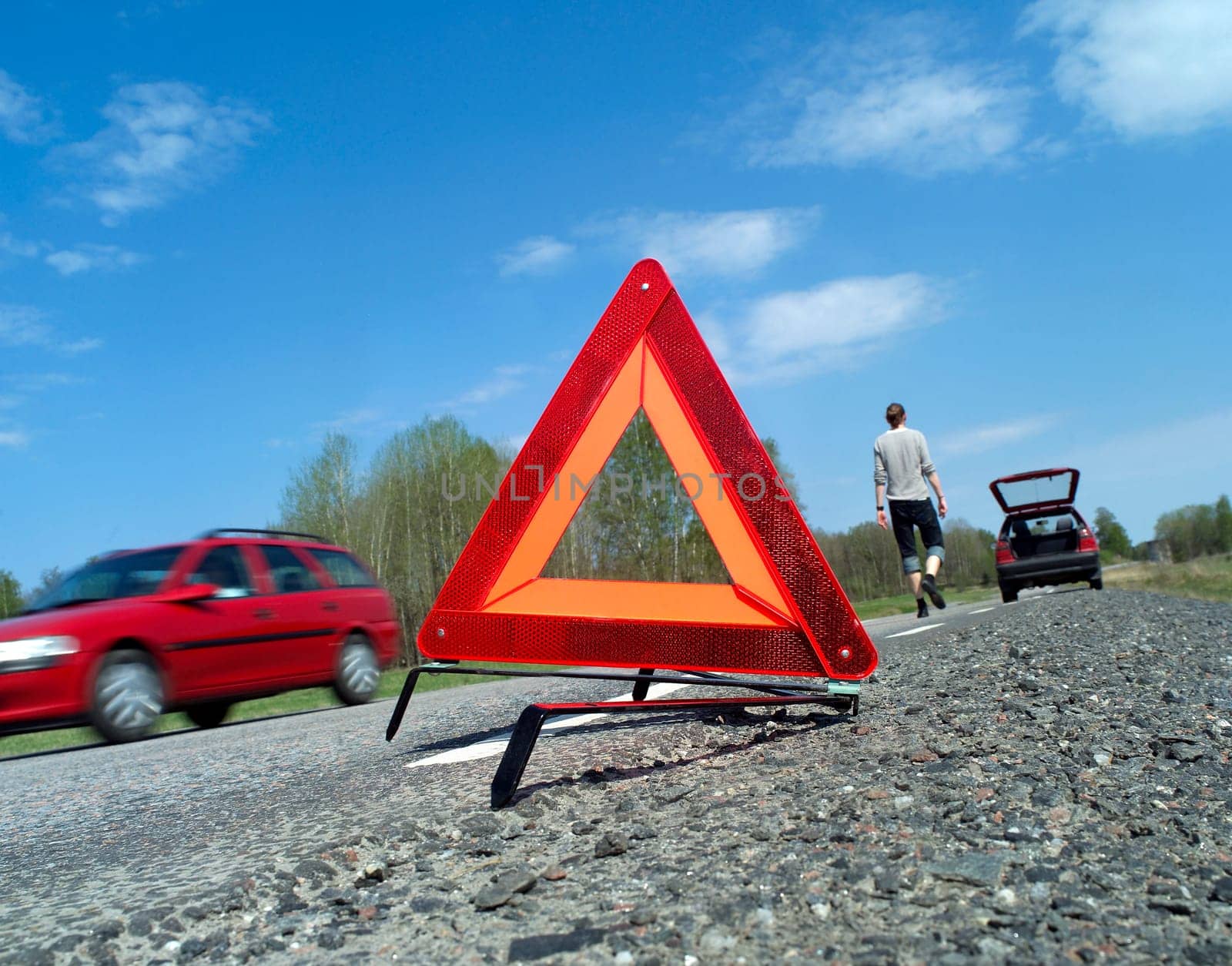 Warning traingle at the side of the road