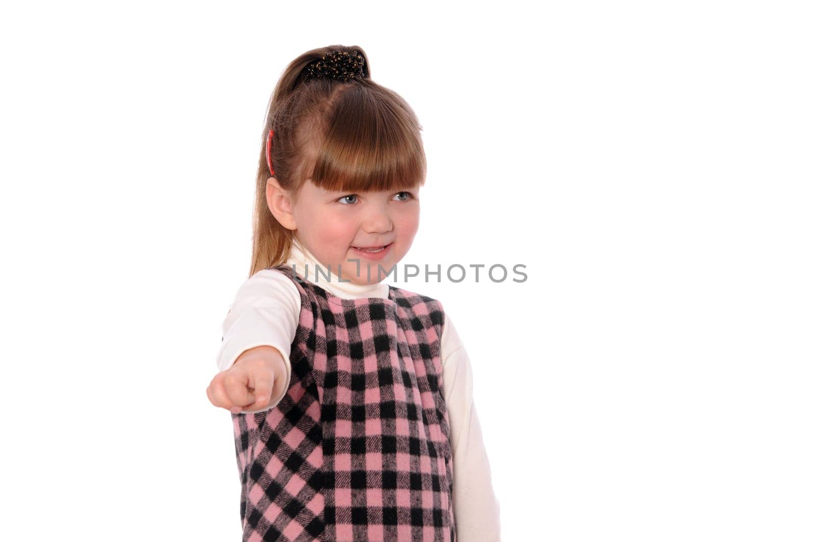 A little girl shows a hand something