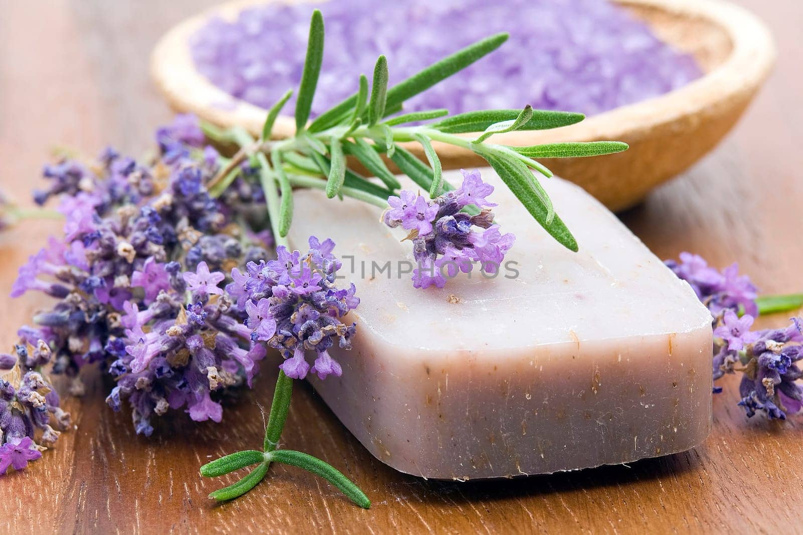 bar of natural soap, herbs and bath salt
