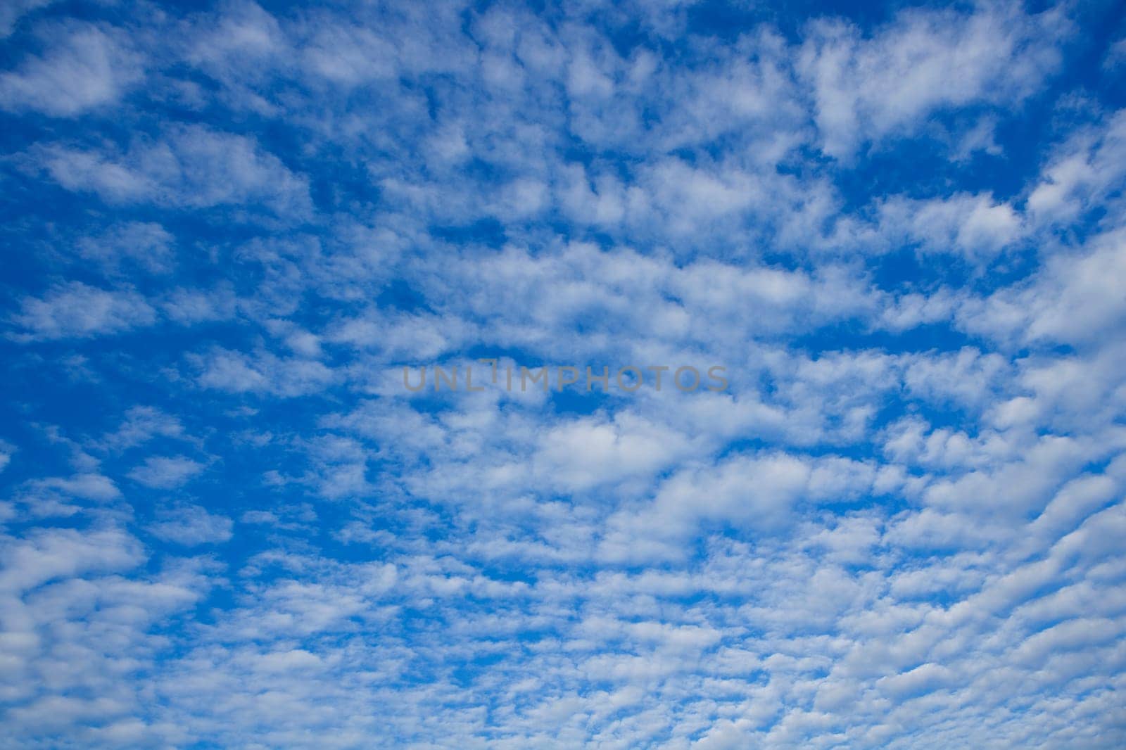 Blue sky with clouds full frame