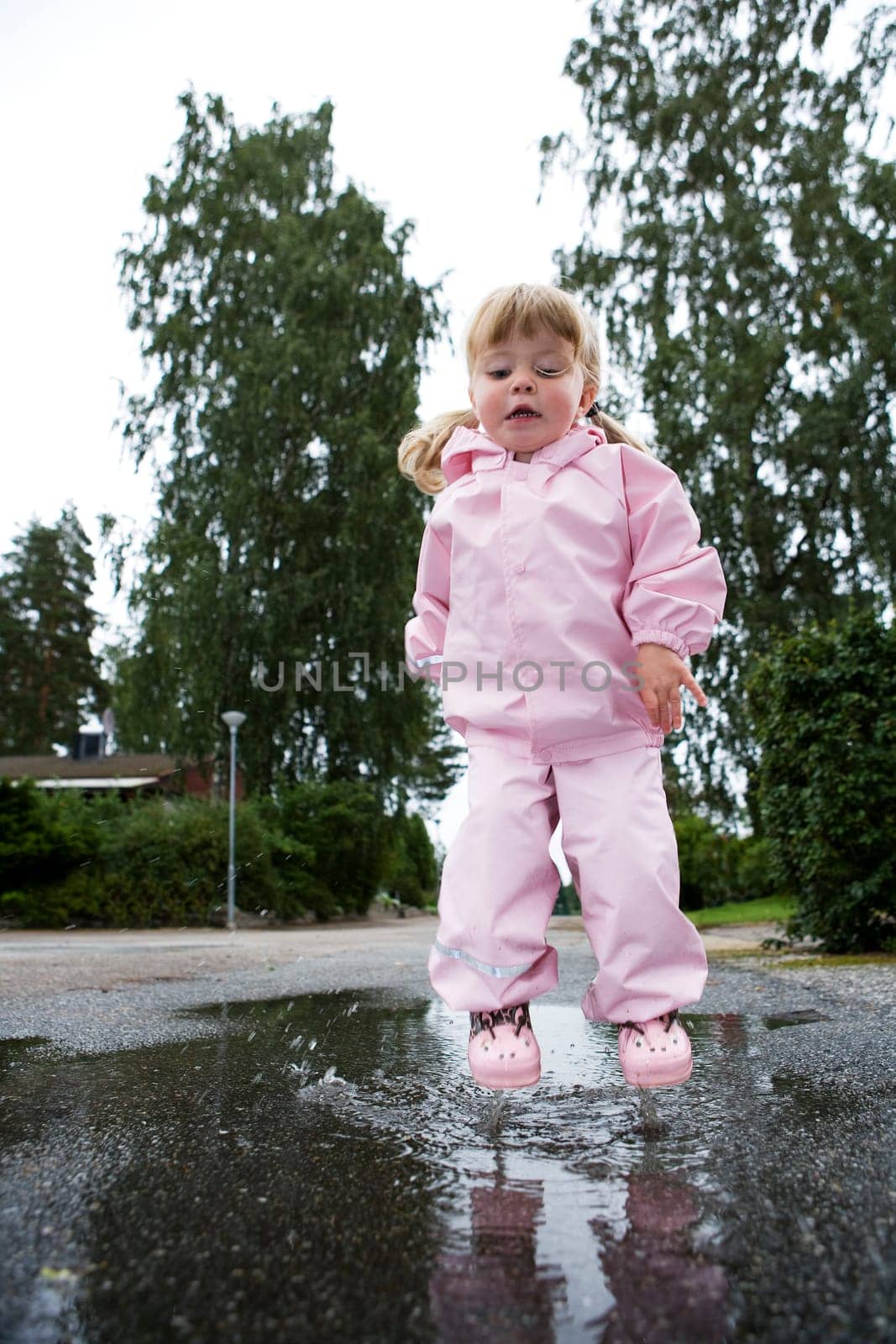 Baby Girl in a pool of water