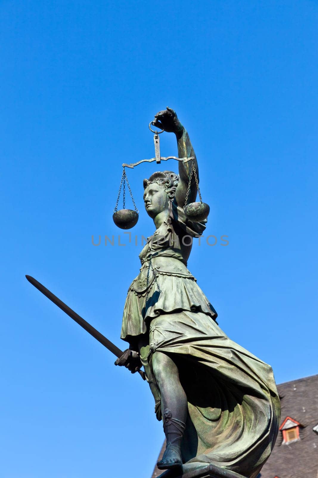 Statue of Lady Justice in front of the Romer in Frankfurt - Germany