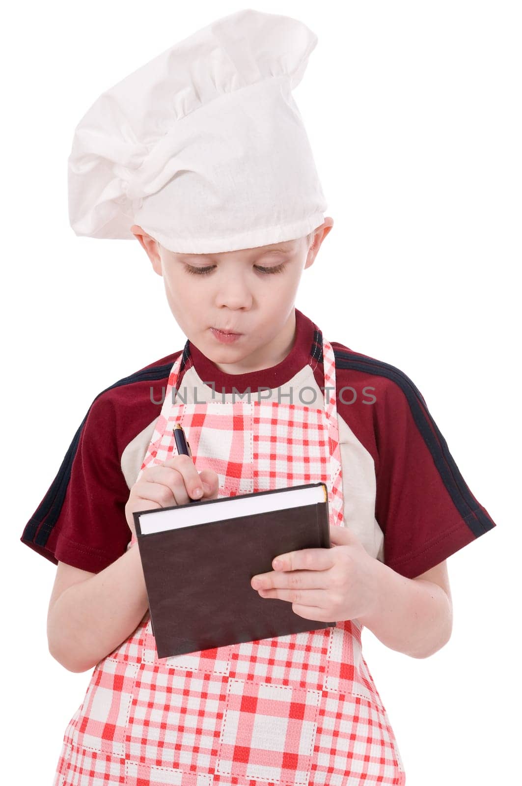 a pensive child chef isolated on white background