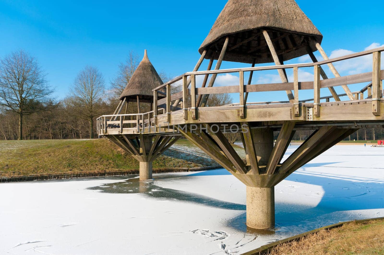 typical footbridge over a frozen canal