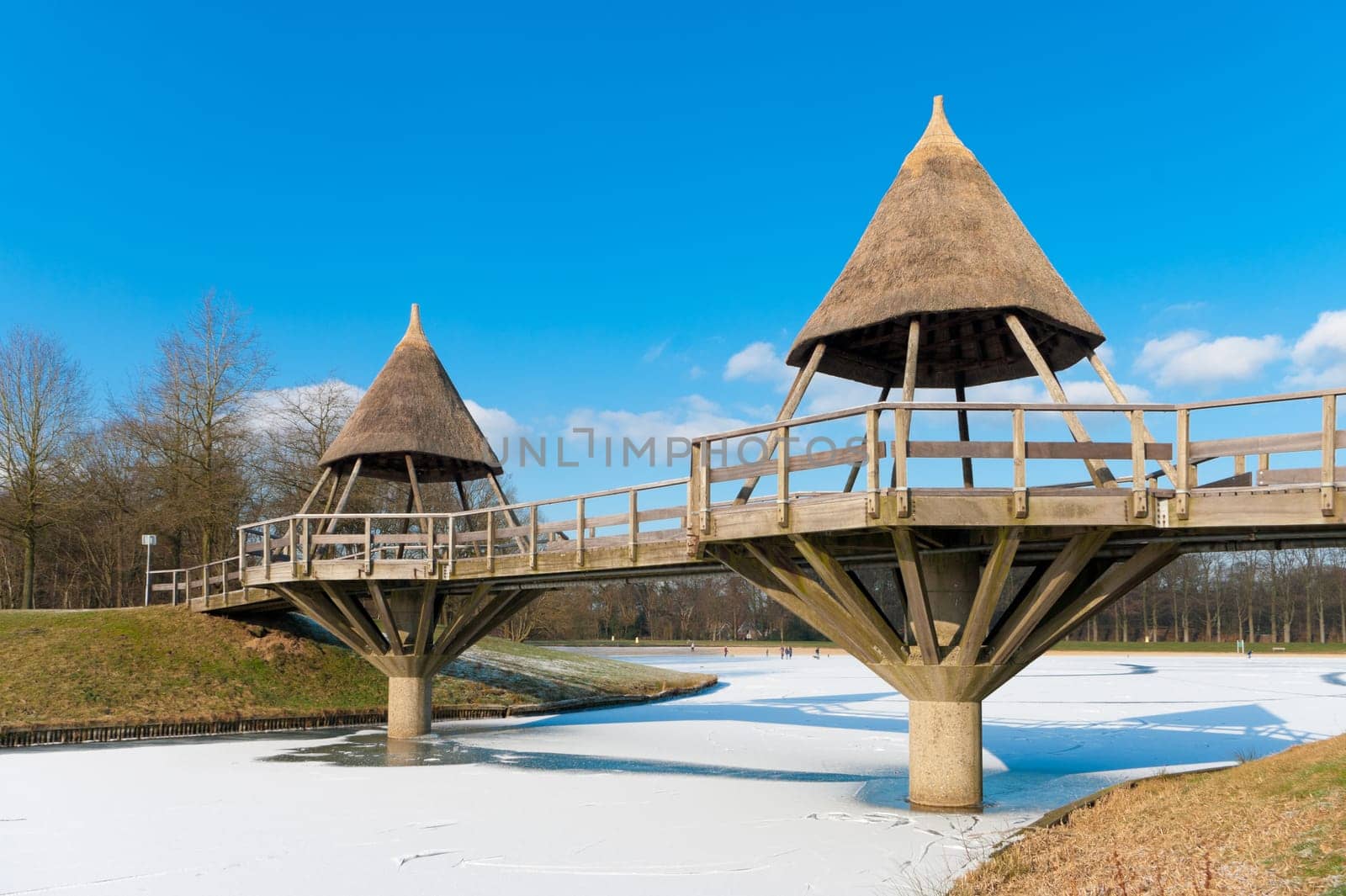 typical footbridge over a frozen canal