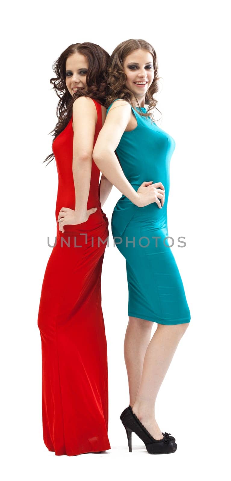 two young fashion women smoky eyes posing on camera in red and green