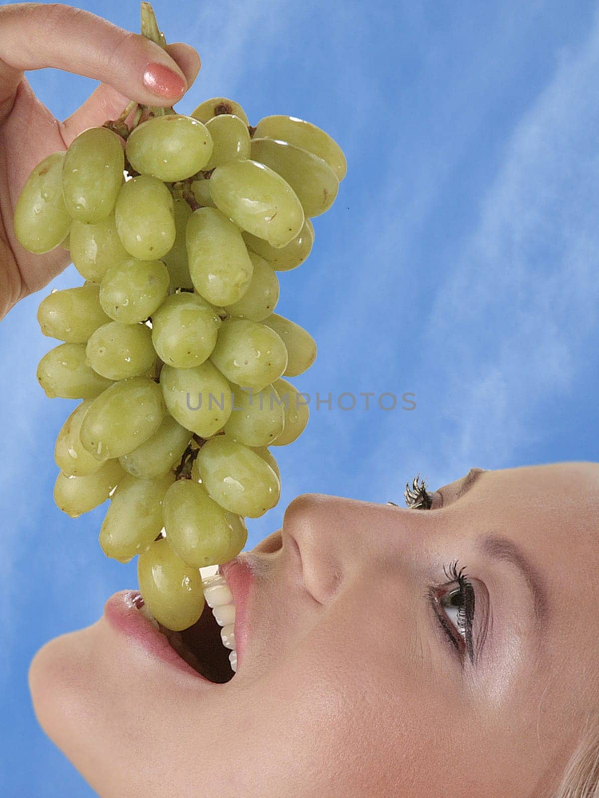 Woman with grapes
