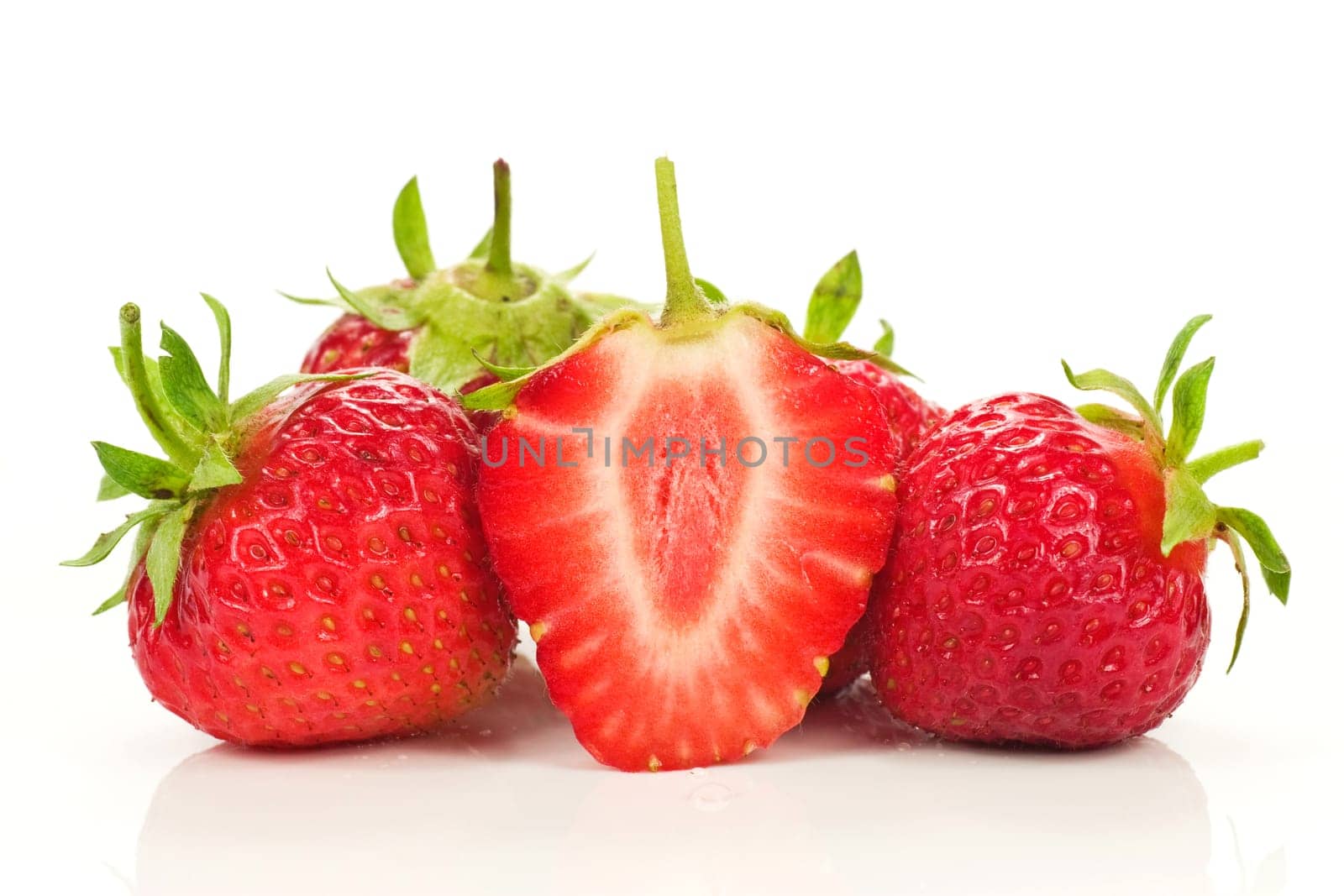 red fresh strawberries, isolated on white background