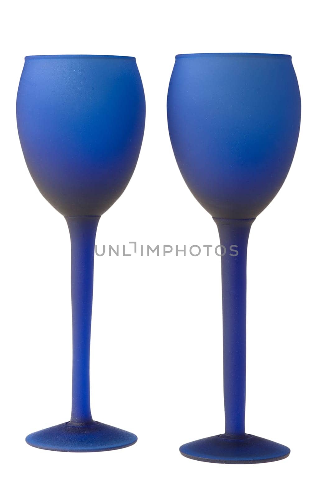 a couple of blue glasses of champagne