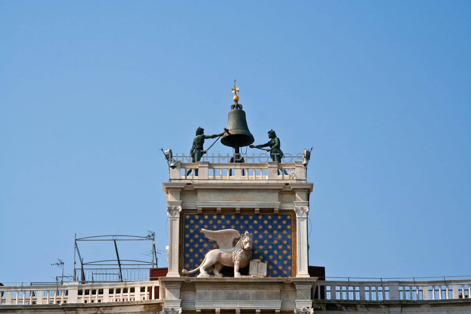 famous clocktower of venice with the old city flag and the lion, venice, Italy
