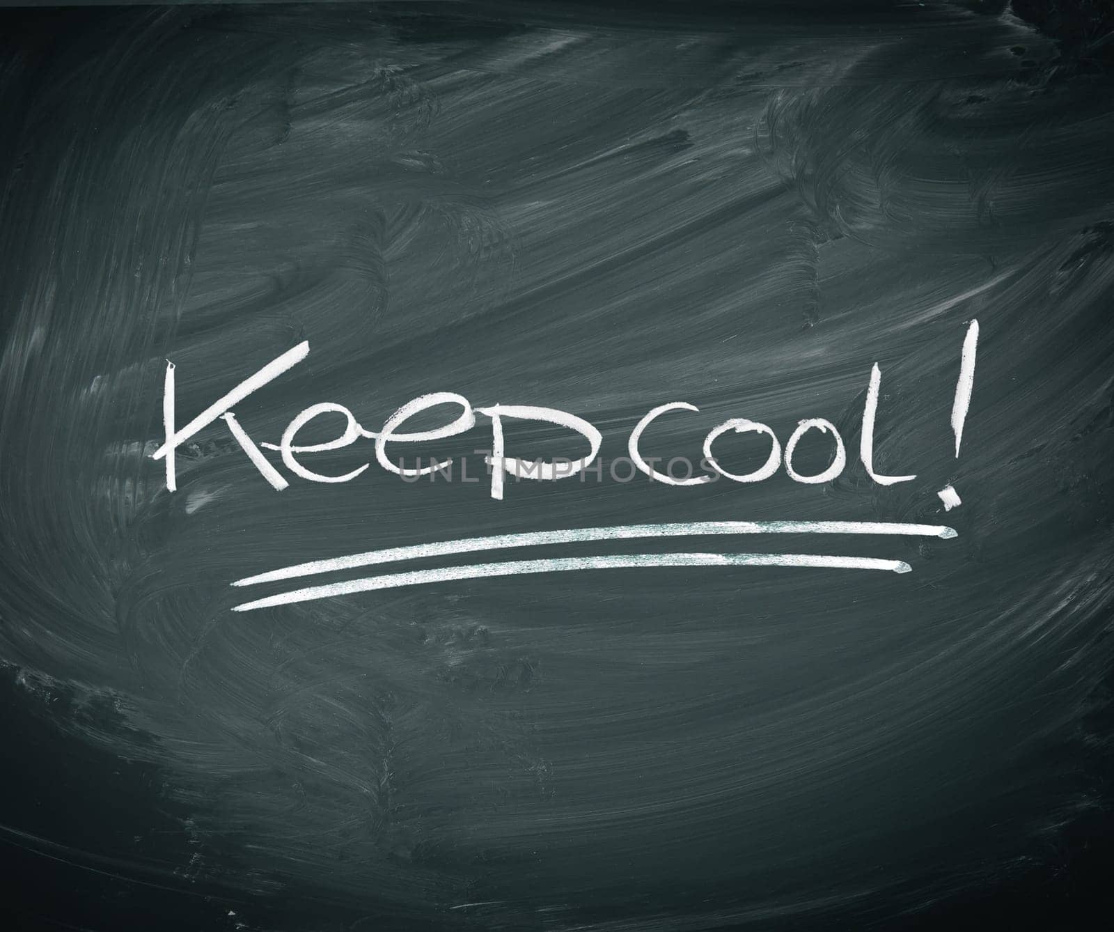 Keep cool, Handritten in chalk on a dirty grunge blackboard.
