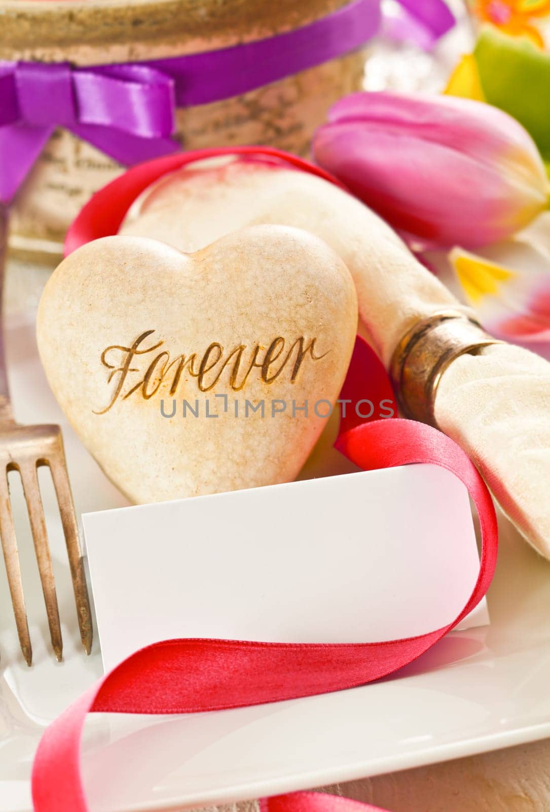 Romantic background with a heart inscribed with the word Forever, an avowal of lifelong commitment in love