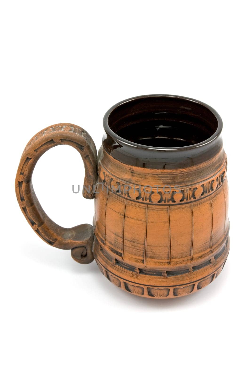 ceramic beer mug over a white background